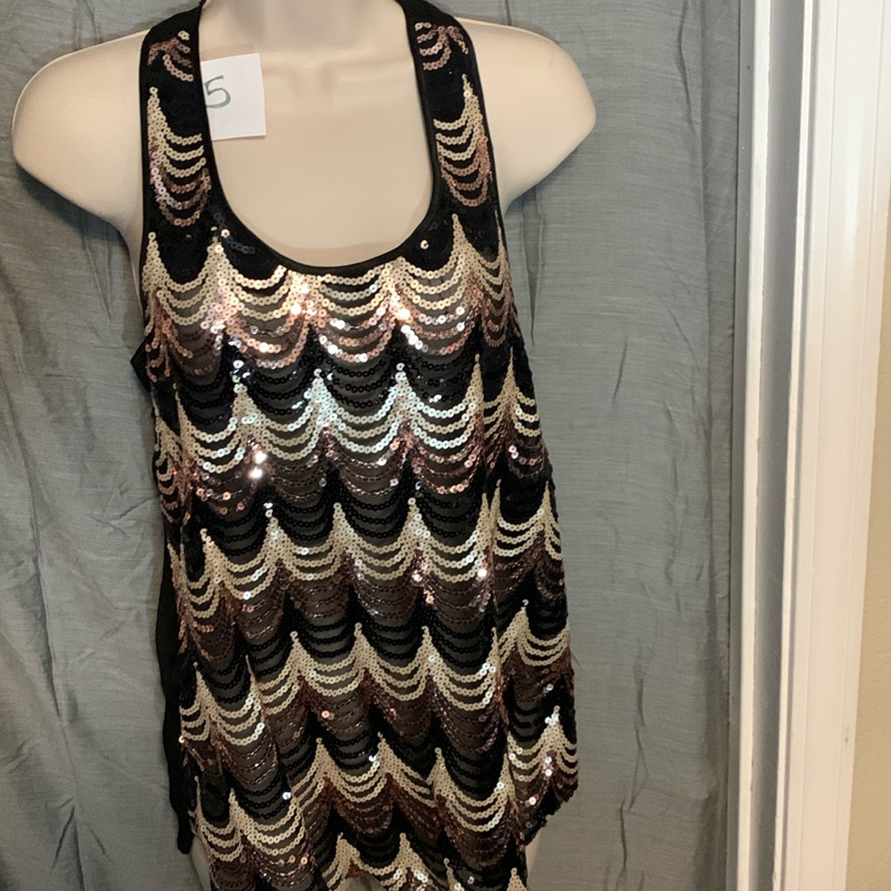 Size XS fits more like a medium sequence, dress sleeveless blouse
